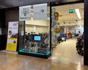 Our Treasure Tree shop, with a glass front showing inside to a range of mobility equipment.