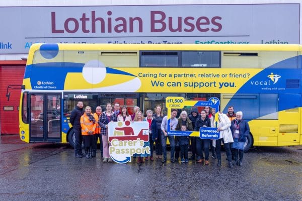 Colleagues from Lothian Buses and Vocal, as well as some carers and volunteers, at Lothian’s Central Depot with Gus the bus.